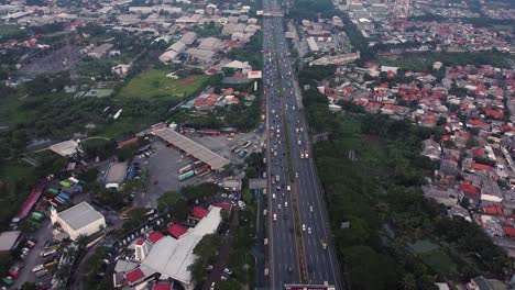 aerial-drone-shot,-highway-traffic-timelapse-during-the-day