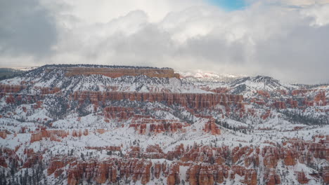 Time-Lapse,-Dense-Clouds-Formation-Above-Mesa-and-Snowy-Winter-Landscape,-Bryce-Canyon-National-Park,-Utah-USA