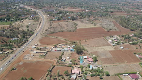 Aerial-dolly-of-a-busy-road-in-a-rural-area-in-Kenya