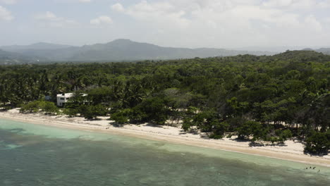 AERIAL---Beach-paradise,-Playa-Teco-Maimon,-Dominican-Republic,-reverse-pan-left