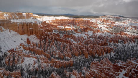 Time-Lapse,-Clouds-and-Shadows-Moving-on-Snow-Capped-Red-Rock-Formations,-Winter-in-Bryce-Canyon-National-Park,-Utah-USA