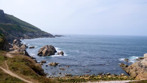 Ocean-coast-with-cliffs,-sea-shore,-ocean-hitting-coast,-sea-shore-landscape,-ocean-scenic-landscape