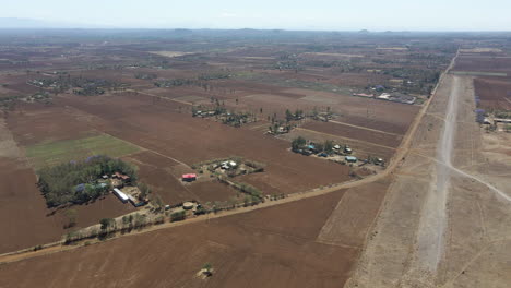 Aerial-pan-of-an-old-and-deserted-airstrip-in-rural-Kenya