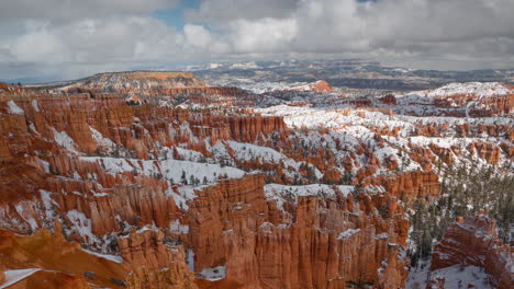 Time-Lapse,-Flowing-Clouds-and-Shadows-Above-Snow-Capped-Red-Sandstone-Landscape-of-Bryce-Canyon-National-Park,-Utah-USA