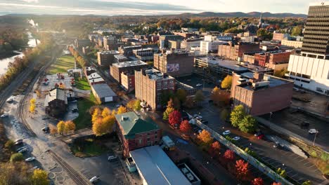 Establishing-shot-aerial-in-autumn-of-America-city-by-river