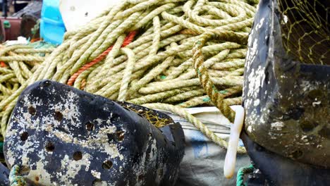 Tangled-fishing-ropes-and-plastic-bucket-trap-harbour-equipment-maritime-accessory-dolly-right