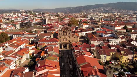 Braga-Portugal-city-drone-fly-above-historical-city-center-old-town-in-a-sunny-day-of-summer,-top-travel-holiday-destination