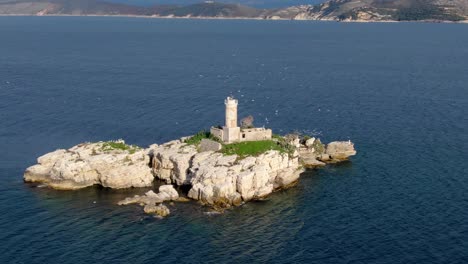 Aerial-beautiful-view-of-lighthouse-with-seagulls-in-corfu-greece