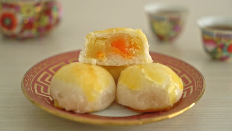 Chinese-pastry-moon-cake-with-salted-egg-peanut-or-Spring-Roll-pastry-with-nuts-and-salted-eggs
