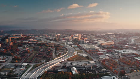 Aerial-drone-timelapse-of-highway-27-in-downtown-Chattanooga,-TN-during-sunrise