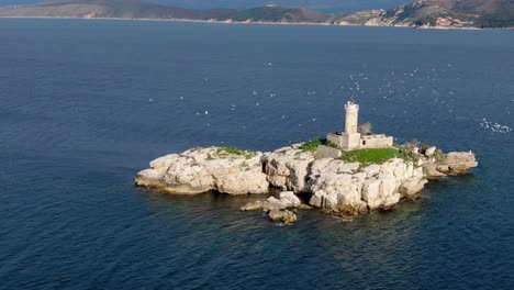 Aerial-drone-beautiful-view-of-lighthouse-with-seagulls-in-corfu-greece