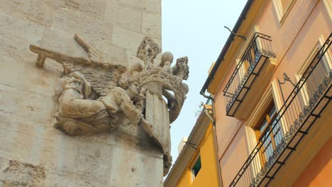 Royal-Arms-Of-Kingdom-of-Valencia-Stone-Sculpture-On-Facade-Of-Lonja-de-la-Seda-In-Valencia,-Spain