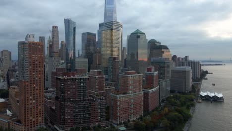Aerial-view-around-office-buildings-in-Manhattan,-in-gloomy-New-York---circling,-drone-shot
