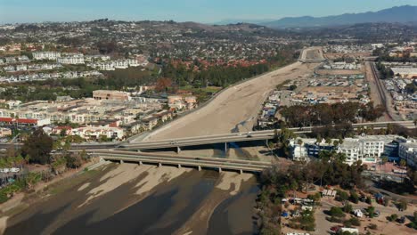 Aerial-view-of-the-drainage-channel-and-overpass-in-Dana-Point,-California