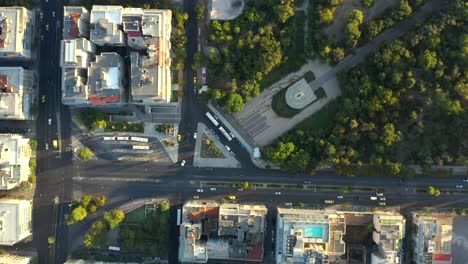 Top-down-view-Buildings-and-Famous-Public-Park-of-Pedion-Areos,-Athens-Downtown,-Greece