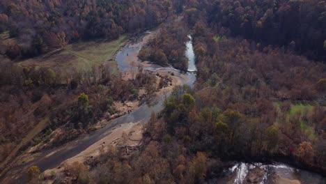 Flying-Over-Creek-And-Forest-In-Autumn---Aerial-shot