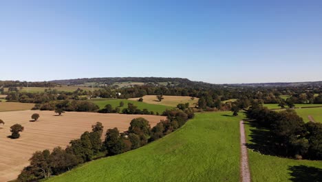 Aerial-backwards-shot-over-Devon-Countryside-on-a-beautiful-summers-day