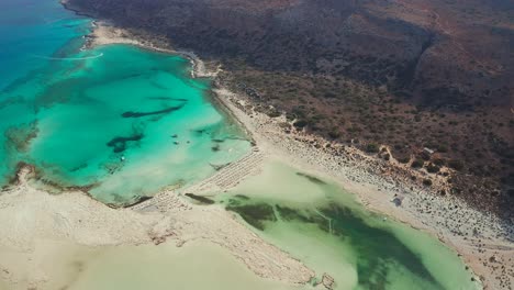 Top-down-view-iconic-Balos-beach-and-lagoon-with-turquoise-clear-water,-Crete-Island