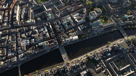 Dublin-Top-Down-Aerial-View,-Ireland,-Downtown,-River-Liffey,-Traffic-on-Grattan-Bridge-and-Buildings,-High-Angle-Birdseye-Drone-Shot
