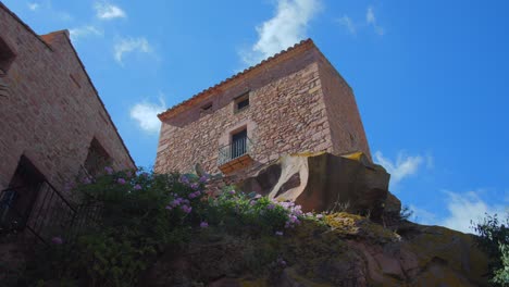 Panning-across-beautiful-historic-tower-Torreta-of-Vilafames-in-Castellon,-Spain