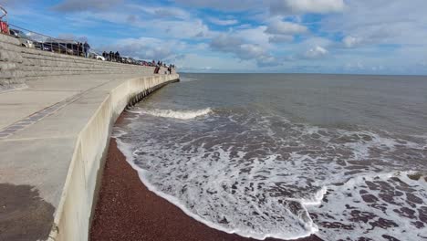 Breakwater-Wall-Beside-Teignmouth-Beach-Car-Park-With-Waves-Gently-Breaking