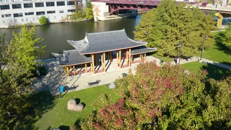 Aerial-View-of-Pagoda-Style-Pavilion-in-Urban-Park,-Chinese-Landscape