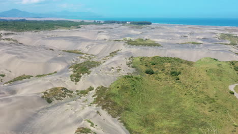 Flying-over-some-dunes-infront-of-the-ocean
