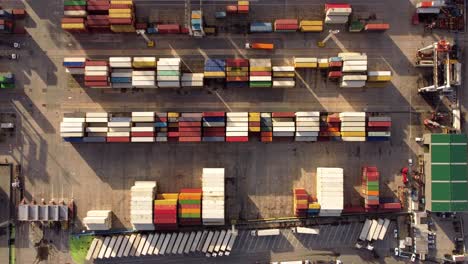 Shipping-containers-stacked-at-a-port-to-recieve-or-send-cargo-to-or-from-oversees