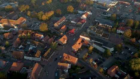View-On-The-Town-Of-Friesoythe-During-Sunrise-In-Cloppenburg,-Lower-Saxony,-Germany---aerial-drone-shot