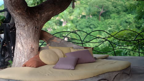 Relaxing-retreat-in-the-jungle-paradise-of-a-tropical-rainforest-with-pad-and-pillows-to-rest-on