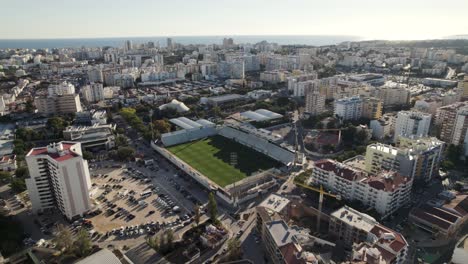 Portimao-empty-municipal-stadium-and-cityscape,-Portugal