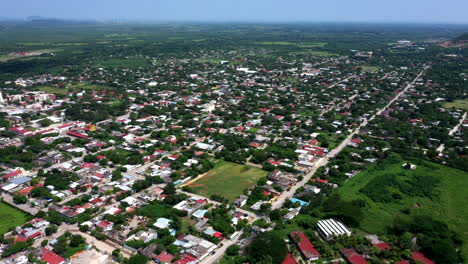 Aerial-view-of-the-suburbs-of-the-city-of-Oaxaca-in-Mexico,-filmed-by-a-drone-with-horizontal-displacement