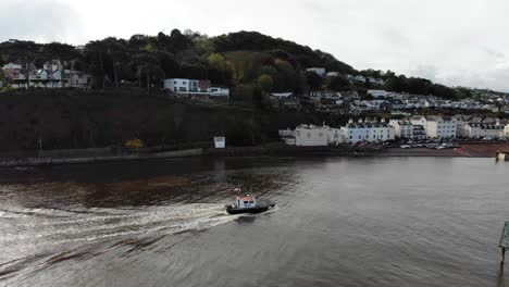 Small-Trawler-Boat-Arriving-Into-River-Teign-With-Shaldon-Beach-In-Background