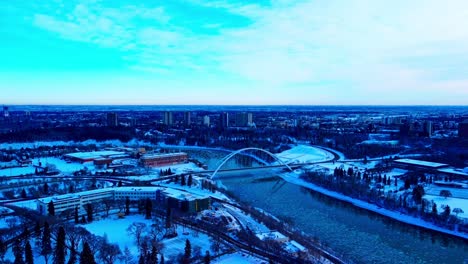 Winter-Aerial-flyover-Edmonton-Alberta-Treasury-Board-and-Finance-building-off-the-River-Valley-Rd-NW-with-partial-ice-circles-move-down-the-North-Saskatchewan-River-by-the-Walter-Dale-Bridge1-3