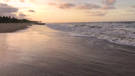 Waves-on-a-sandy-Caribbean-Sea-beach-during-golden-hour