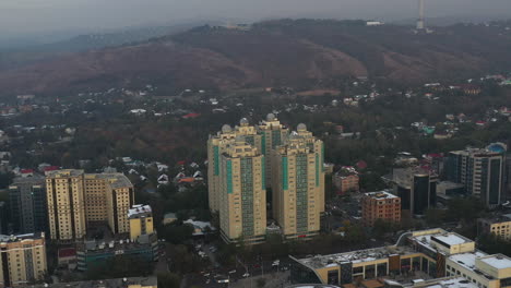 Rotating-cinematic-shot-around-skyscrapers-of-the-Big-Almaty-City-in-Kazakhstan