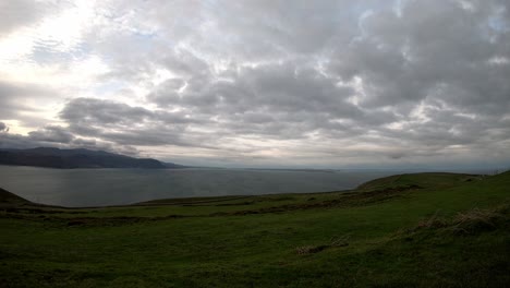 Timelapse-morning-cloud-cover-passing-over-green-Welsh-mountain-landscape