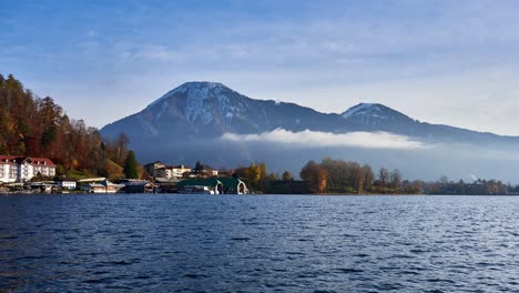 Tranquil-timelapse-of-background-snowcapped-mountains-in-the-alps-with-Tegernsee-in-the-foreground