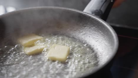 Melting-butter-is-tossed-in-a-pan