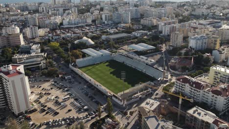 Aerial-Top-down-view-Soccer-Stadium-at-city-centre-of-Portimão---Algarve