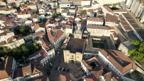 Aerial-top-down-view-Old-Coimbra-Romanesque-Cathedral,-historic-Downtown---Portugal