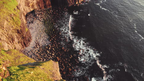 Cinematic-aerial-of-cliffs-of-moher,-Ireland-during-golden-hour-on-sunny-day