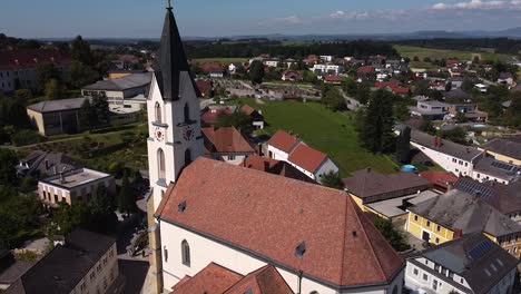 Drone-flies-by-a-church-in-Austria--Steinakirchen-am-Forst