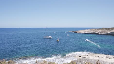 Boats-are-sailing-on-the-water-of-Mediterranean-sea-in-Malta