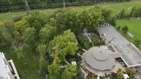 Aerial-View-Of-Pavilion-With-Outdoor-Wedding-Happening-In-The-Garden