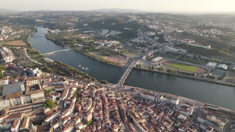 Panoramic-view-of-Coimbra-city,-Portugal.-Aerial-orbit