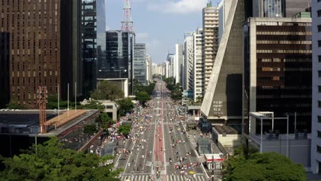 Beautiful-aerial-drone-dolly-in-shot-of-the-famous-Paulista-Avenue-in-the-center-of-São-Paulo-with-giant-skyscrapers-surrounding-a-2
