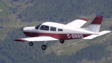 Close-Up-Shot-of-a-Flying-Piper-PA-28-Private-Airplane