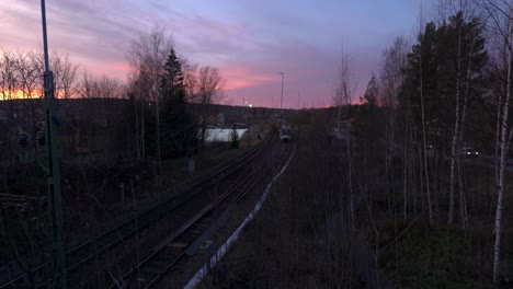 Train-Arrives-In-Rural-Countryside-During-Sunrise