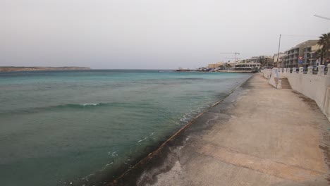 The-Popular-Tourist-Resort-of-Mellieha-in-Malta-on-a-Windy-Day